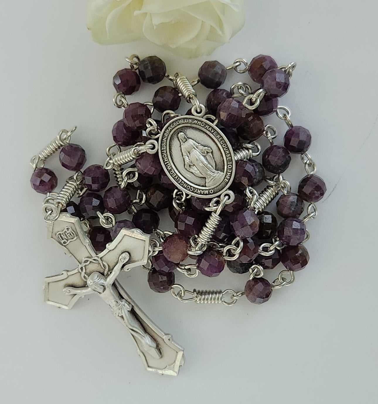 Purple ruby beads with sterling silver cross and crucifix rosary