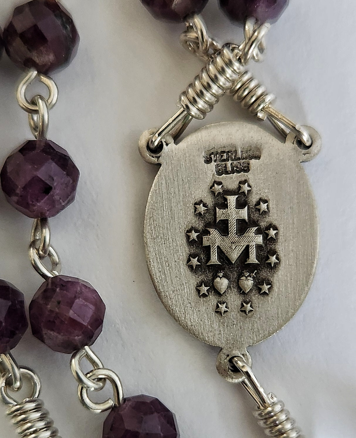 Purple ruby beads with sterling silver cross and crucifix rosary