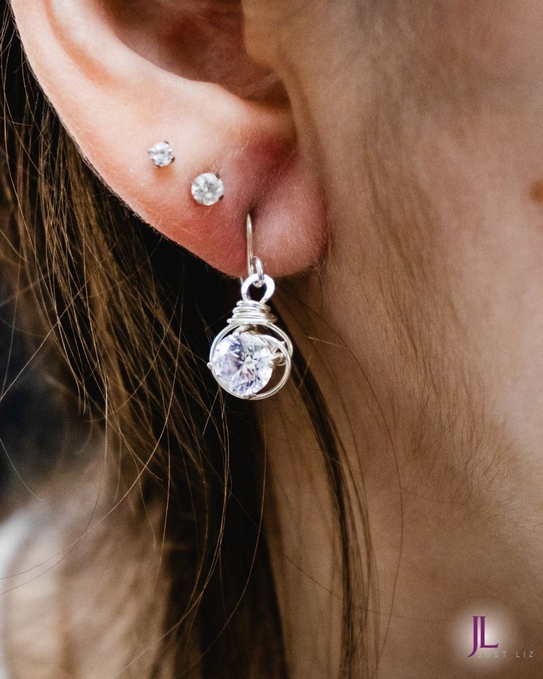 Cubic Zirconia Swirl Sterling Silver Earrings