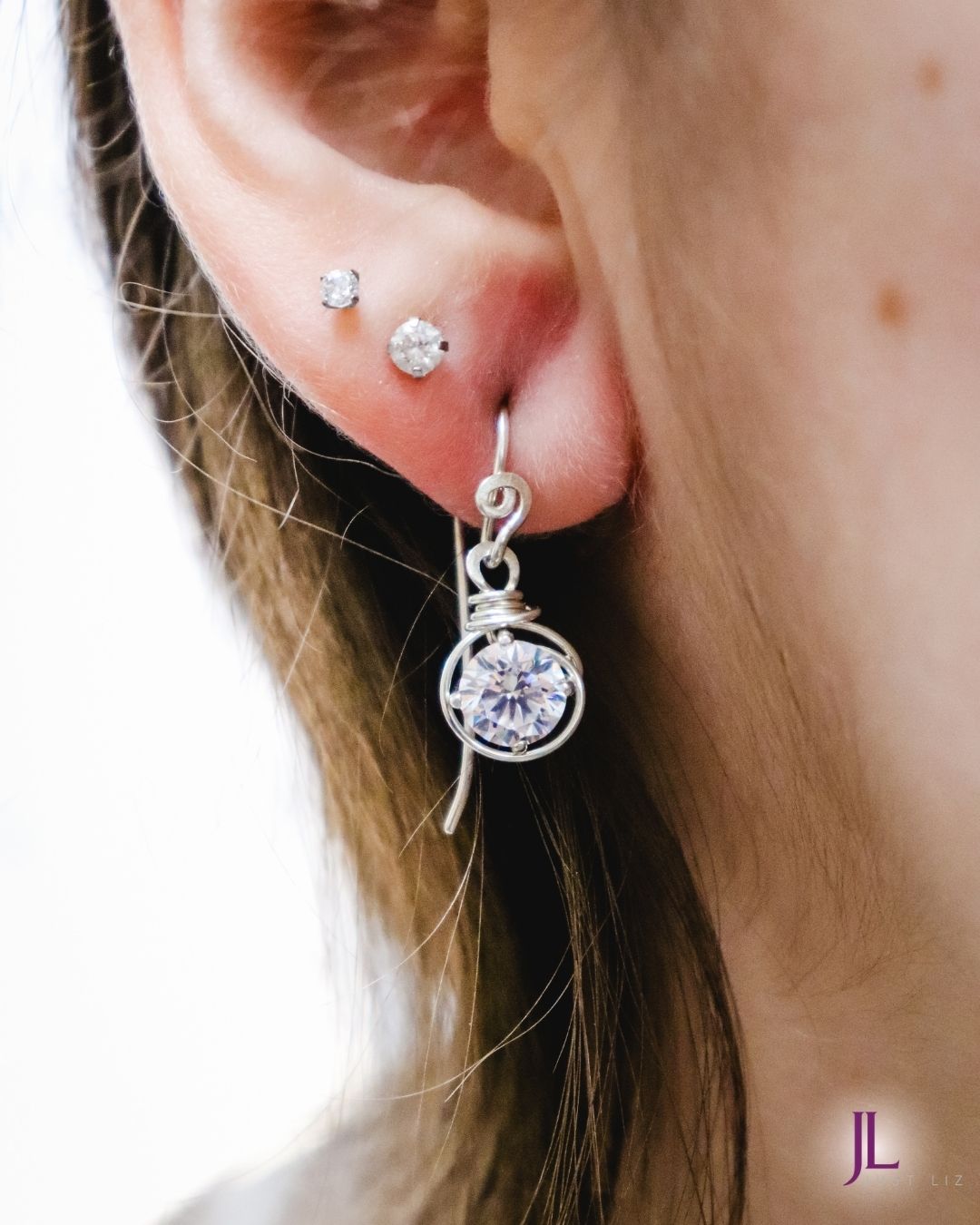 Cubic Zirconia Swirl Sterling Silver Earrings
