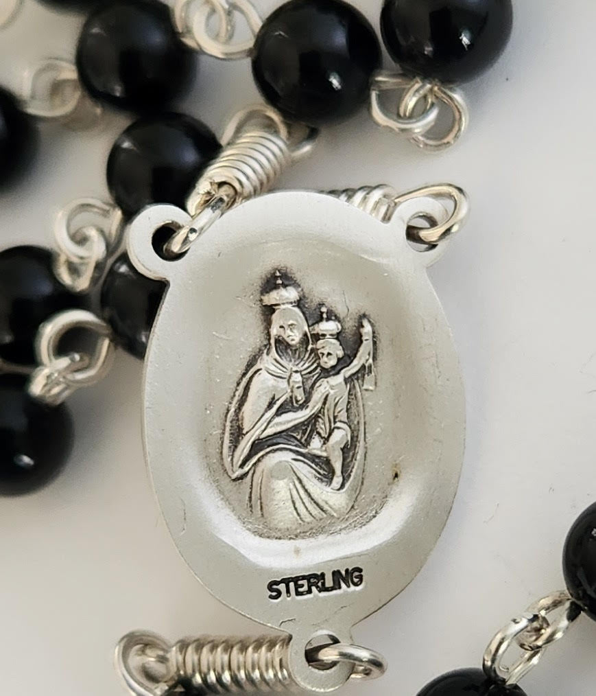 Black beads with sterling silver cross and crucifix rosary