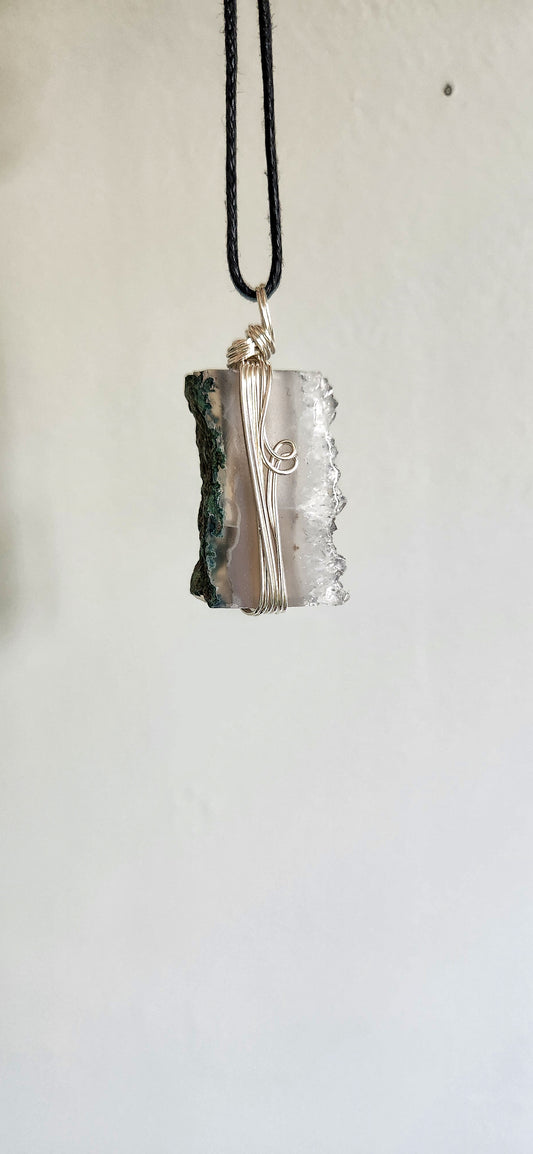 A rectangular blue and green stone necklace